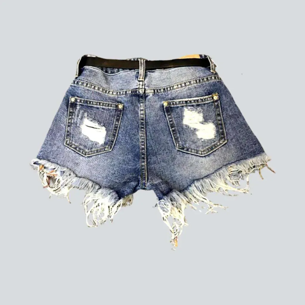 Grunge-style distressed denim shorts