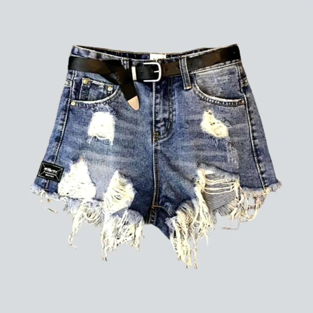 Grunge-style distressed denim shorts