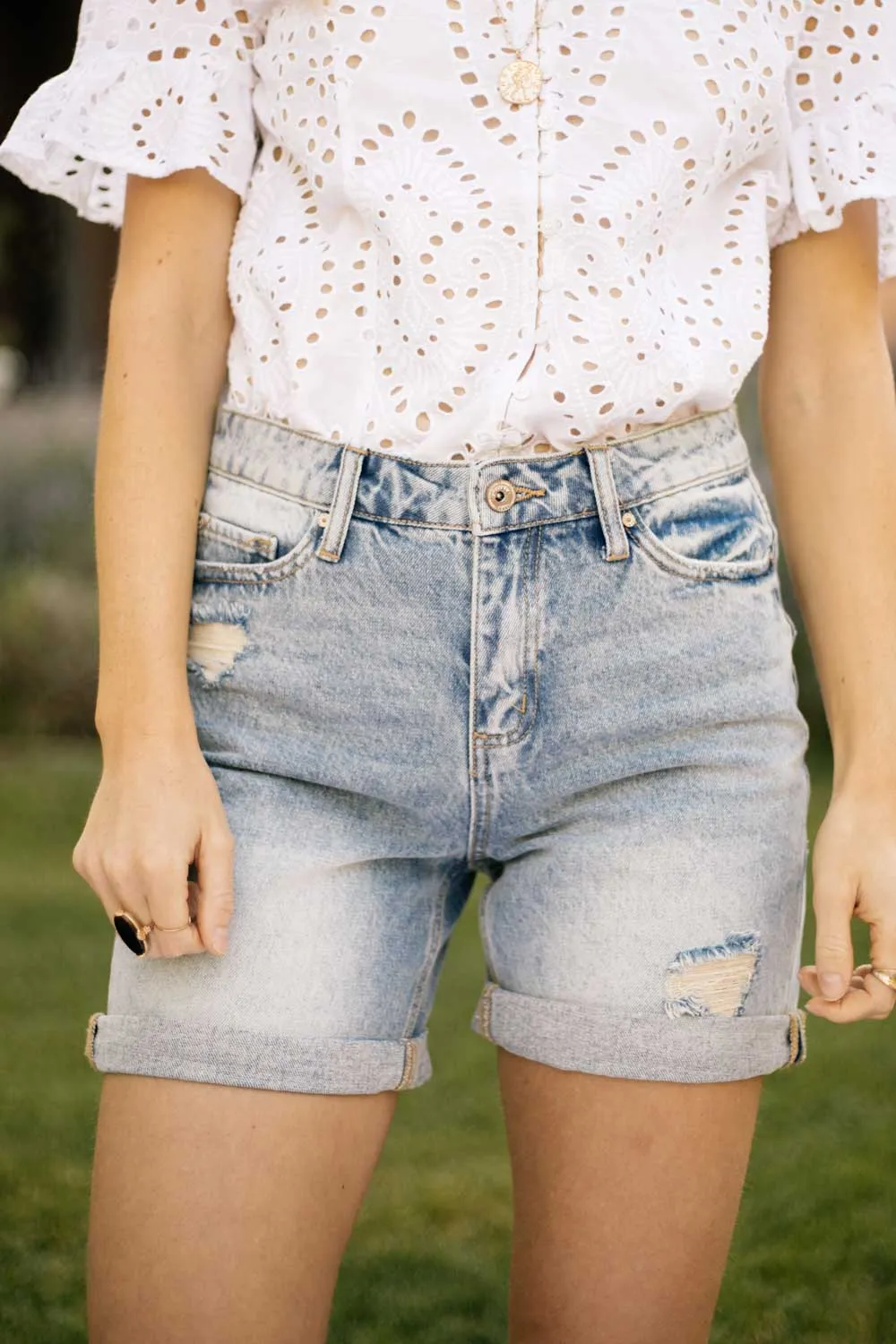 Mid Rise Distressed Denim Shorts