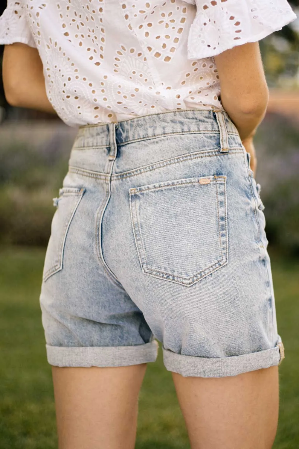 Mid Rise Distressed Denim Shorts