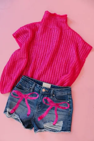 PINK BOW DISTRESSED DENIM SHORTS